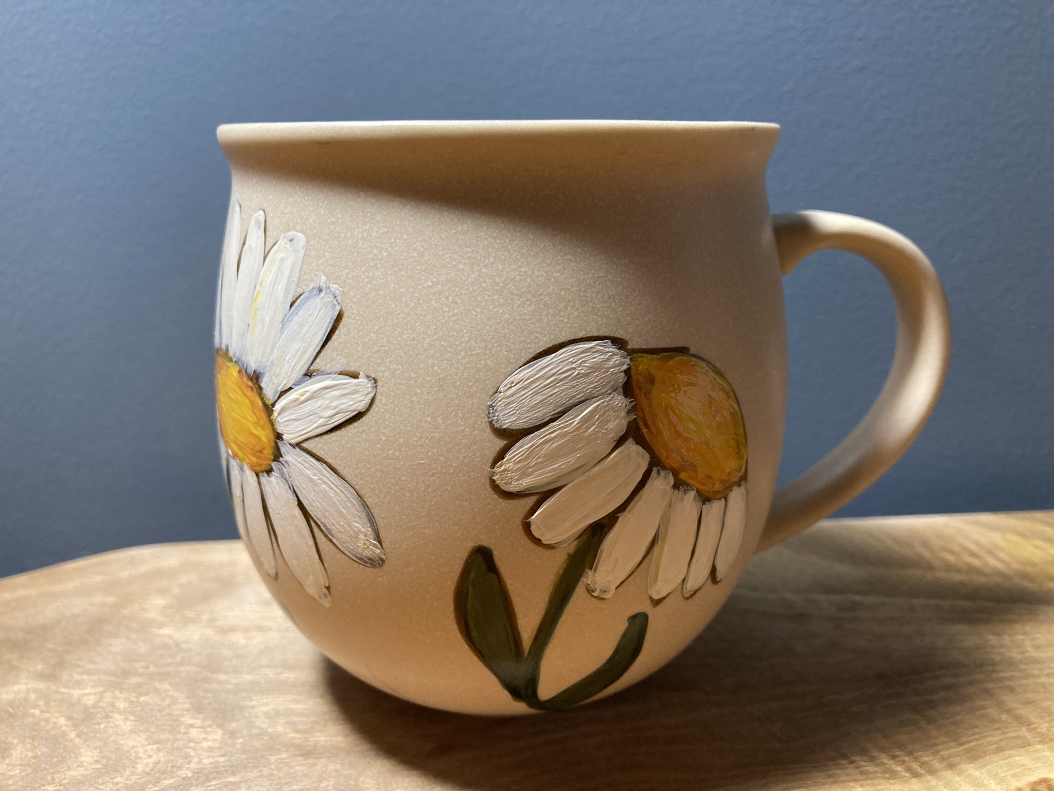 Pink mug hand-painted with daisies