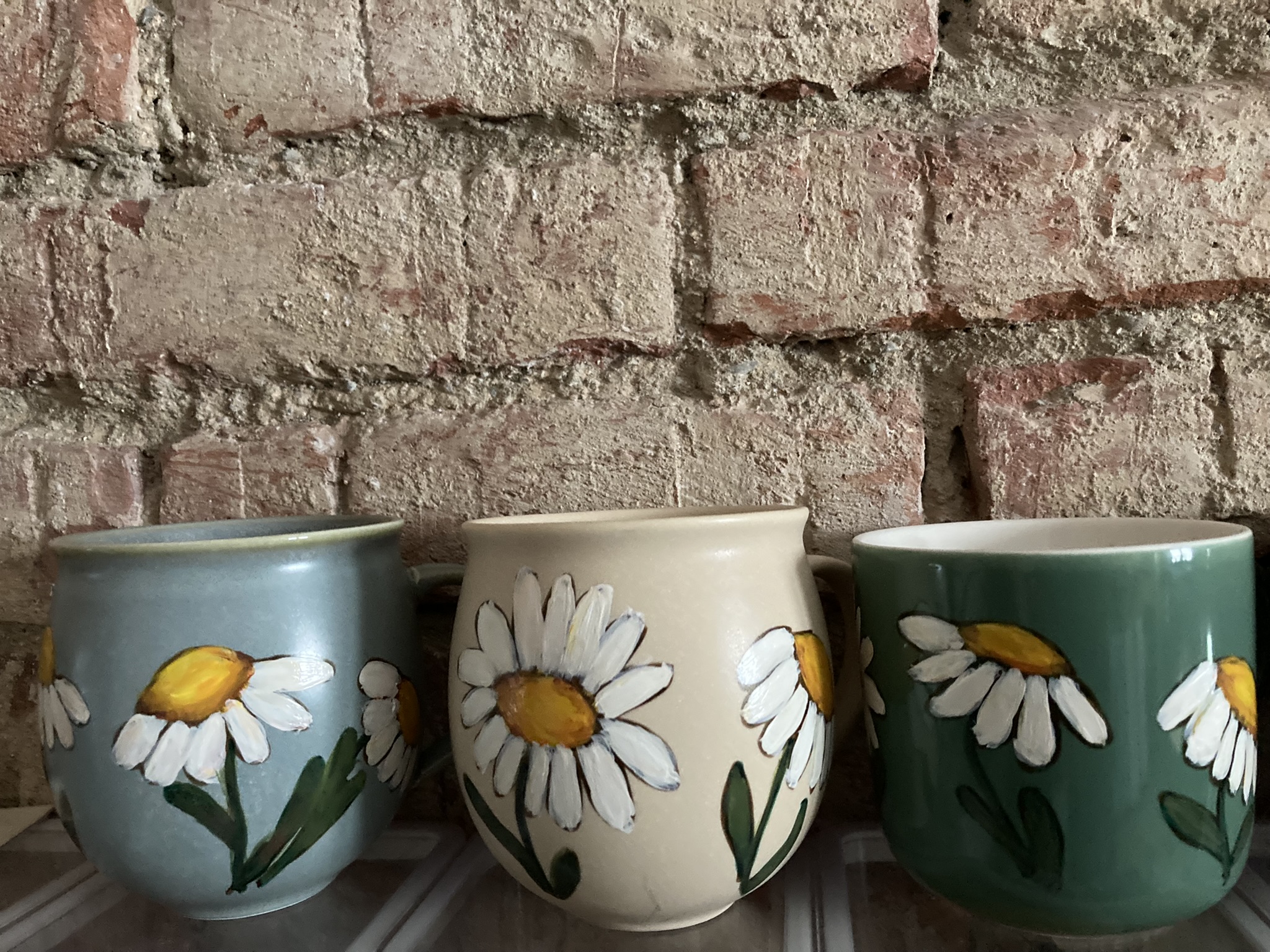 Set of hand-painted mugs