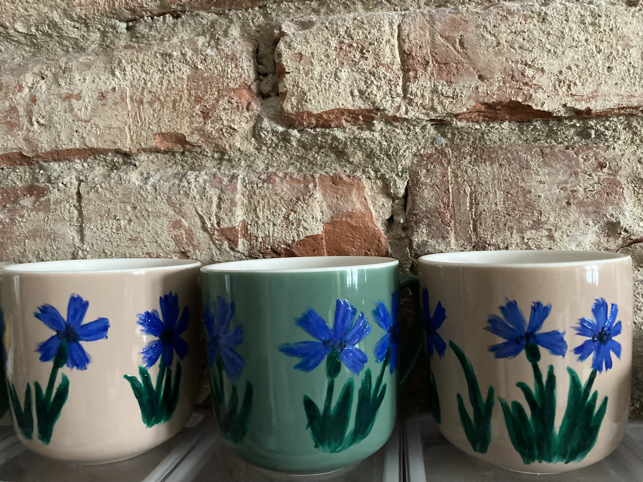 Set of mugs hand-painted with cornflowers